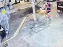 Moment police officer is blasted in foot with sawn-off shotgun as revellers scatter in fear