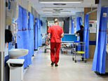 Nurse who scammed NHS out of £7,000 by claiming sick pay while working nearly 120 shifts elsewhere is suspended for six months