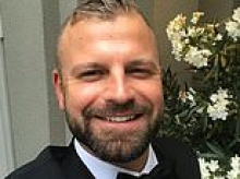 BA passenger brain damaged after slipping on spilt Baileys is accused of exaggerating disability as friend tells court he saw him 'working and training to sail boat on Med'