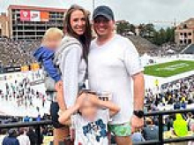 Airman who died after falling 150 feet while rappelling into college football game identified as young married father of two sons