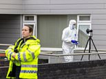 Woman, 47, dies after car crashes into wall as police arrest man, 61, on suspicion of murder