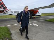 Meet the Flying Banker! One woman defies gales to serve remote customers on northerly islands
