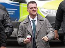Daily Mail journalist was left 'scared to leave the house' and still feels at risk of 'vigilante attack' after being targeted by Tommy Robinson, court hears