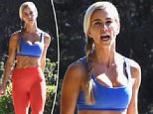 Katie Zacharia dons Superwoman-colored lycra exercise outfit in first sighting since she quit as White House Press Secretary after five disastrous days