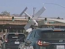 Dramatic moment small plane smashes into overpass and crashes into traffic while trying to make emergency landing