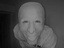 Terrifying nightmare as stranger in Biden mask eats banana on Texas family's doorbell camera, before observers discover intruders disturbing hidden message