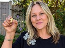 Cross? I was delighted! Metal detectorist finds £20,000 gold treasure in farmer's field