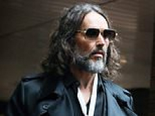 Russell Brand 'raped young fan at his £2.3million Hampstead mansion after handpicking her out of line-up at gig and promising to 