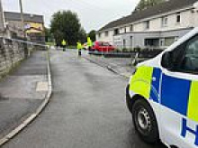 Female carer, 47, died in crash trying to drive herself to hospital after retirement village attack - as man, 61, is arrested for murder